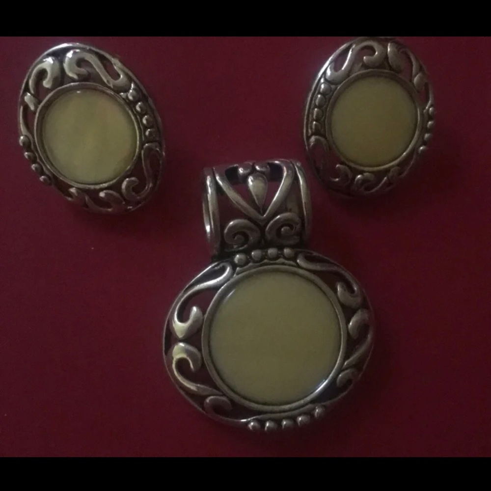 Matching set. Pendant, Earrings and bracelet in good condition.